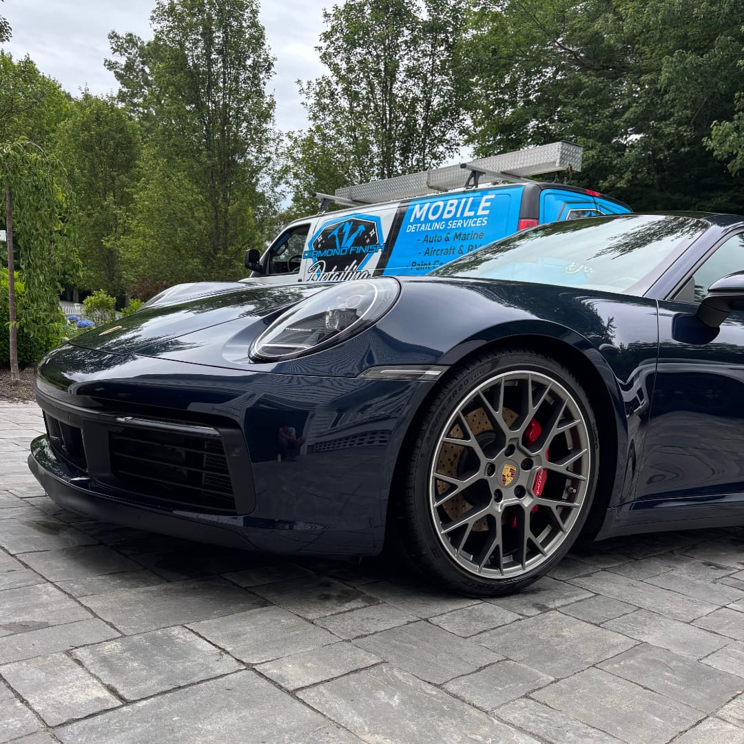 Porsche with DFD detailing truck