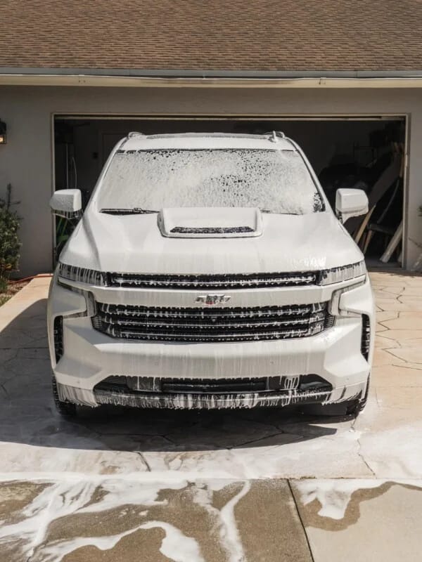 SUV foam wash in driveway
